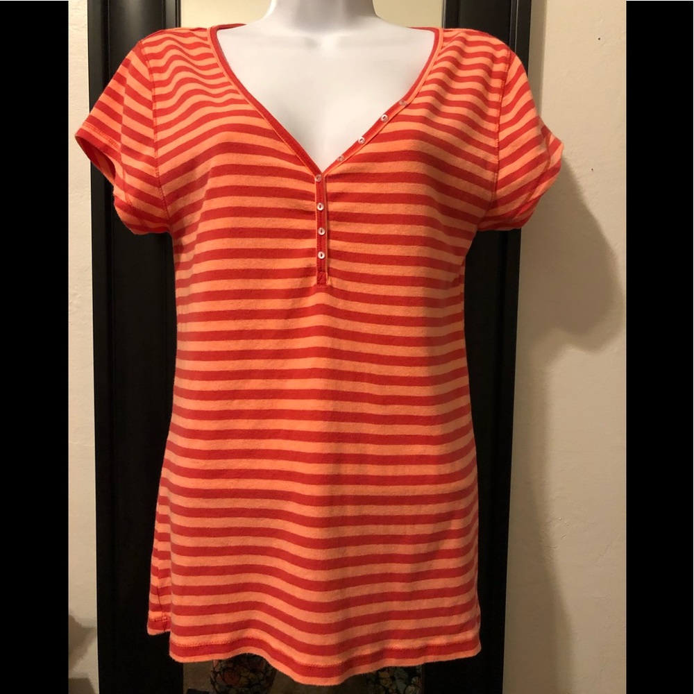 Orange and red tee shirt.